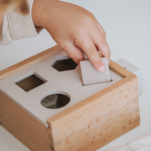 Recognizing shapes in a playful way is much more fun thanks to this shape sorting box!⁣
⁣
⁣
⁣
#labellabel #woodtoys #sustainabletoys #woodentoy #shapesorter #shapesorting #learnshapes #shapes #woodentoys #playroom